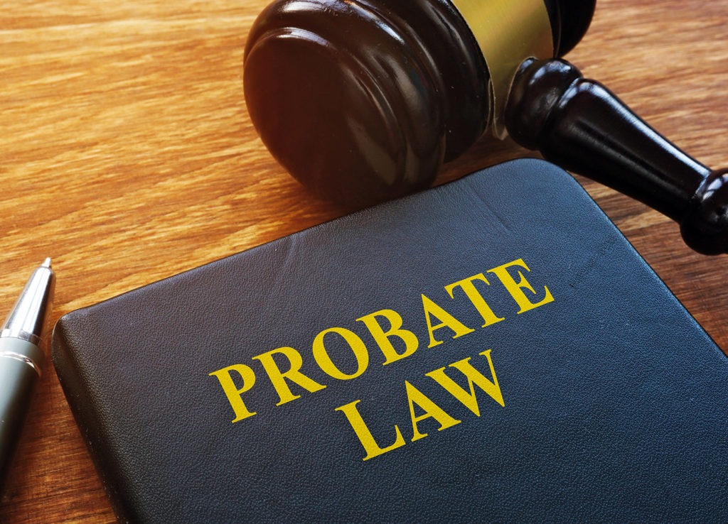 Probate Law book and wooden gavel in the court.