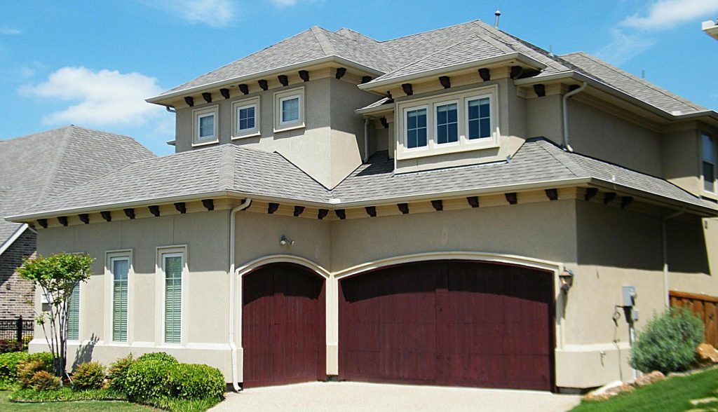spanish style home with double garage
