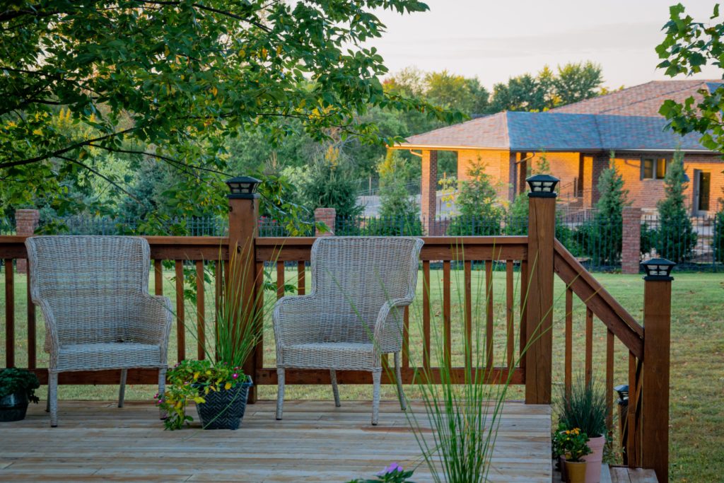 backyard deck with lawn furniture