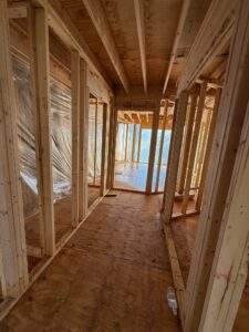 Framing for luxury home addition in Pittsburgh, showing interior construction.