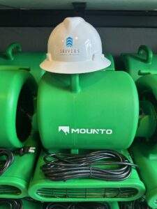 3Rivers General Contracting hard hat on a MOUNTO air mover.