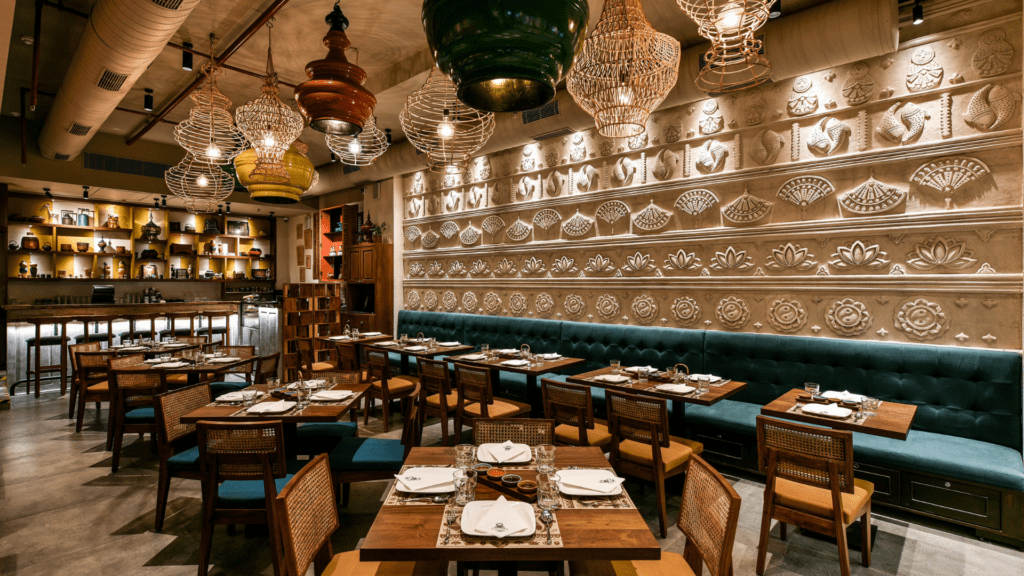 Elegant restaurant interior with ornate lighting and seating