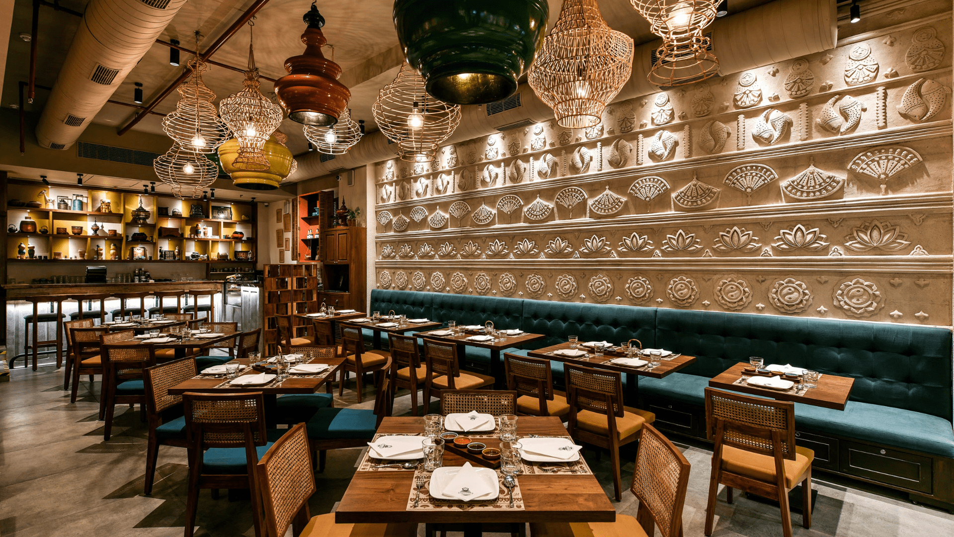 Elegant restaurant interior with ornate lighting and seating