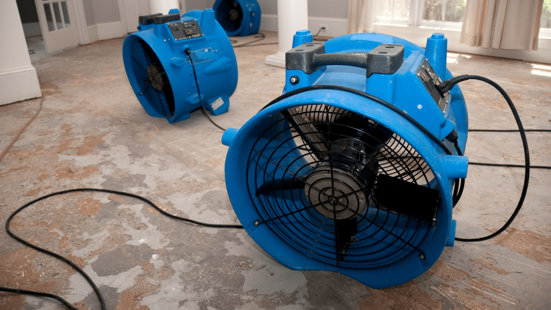 Blue air movers used for fire damage mitigation and restoration in Pittsburgh.